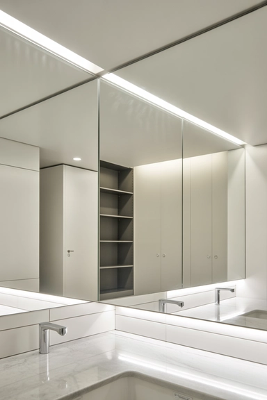21 Hidden Storage Solutions That Keep Clutter Completely Out of Sight 14 Mirrored Storage That Doubles as Visual Expansion