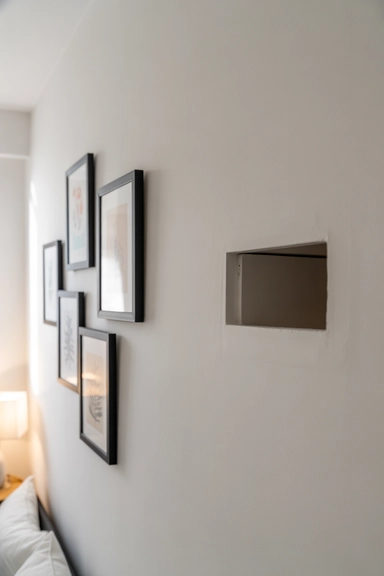 23 Bedroom Organizing Ideas That Reduce Visual Clutter Instantly 15 Hidden Storage Behind Decorative Panels or Artwork