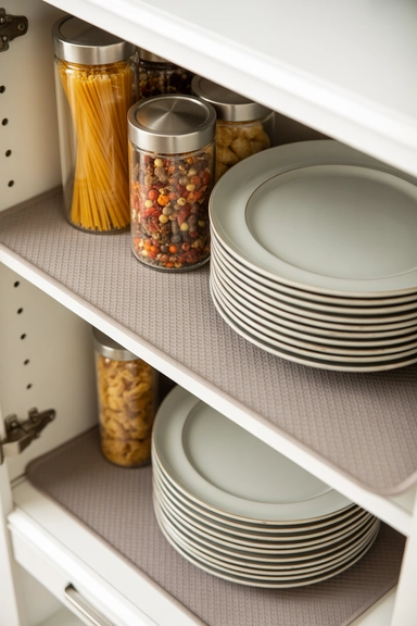 Removable Shelf Liners That Protect and Stabilize Items