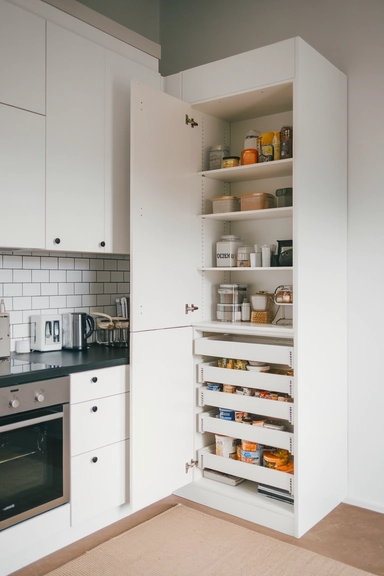  Retrofit IKEA Pax Frames as Custom Pull-Out Pantry Units