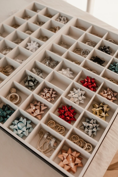21 Gift Wrap Storage Ideas That Keep Supplies Organized 17 Compartment Bins for Bows and Embellishments