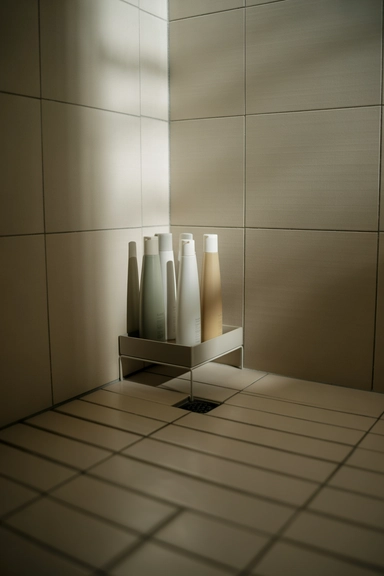 Bottle Grouping Tray That Prevents Floor Clutter