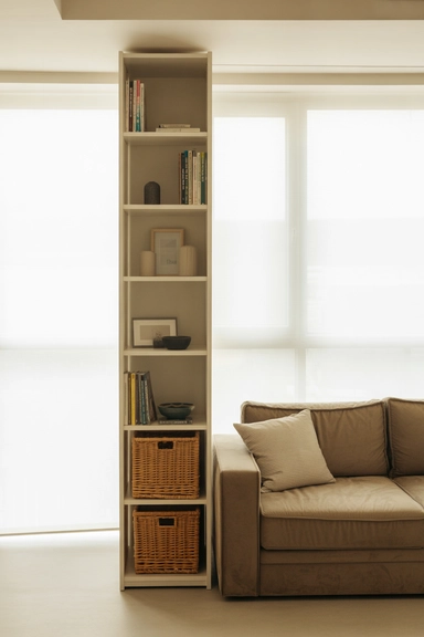 25 Small Living Room Storage Ideas That Reduce Visual Clutter 4 Tall Narrow Shelving That Uses Height Without Adding Width