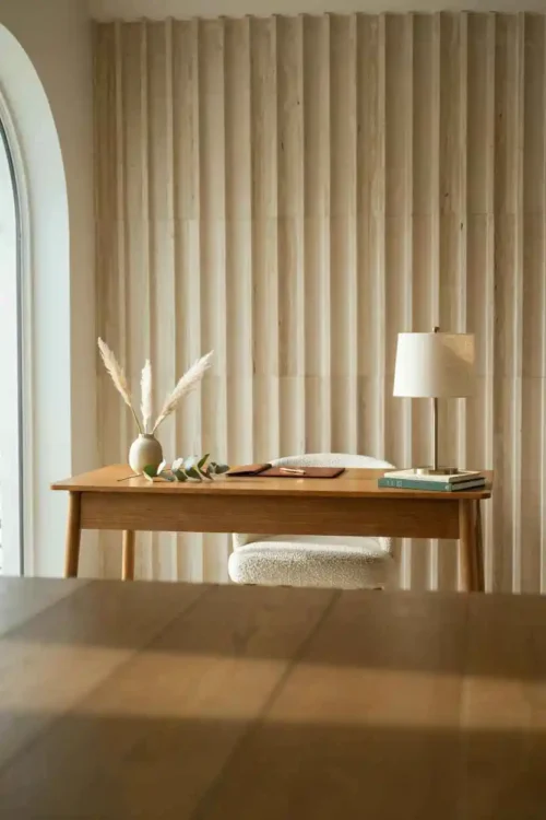 The Desk in Front of a Statement Wall