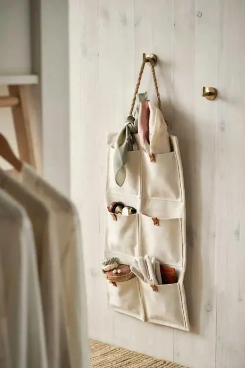 27 DIY Closet Organization Ideas Anyone Can Build 26 Canvas Pocket Organizer Hanging From Rope
